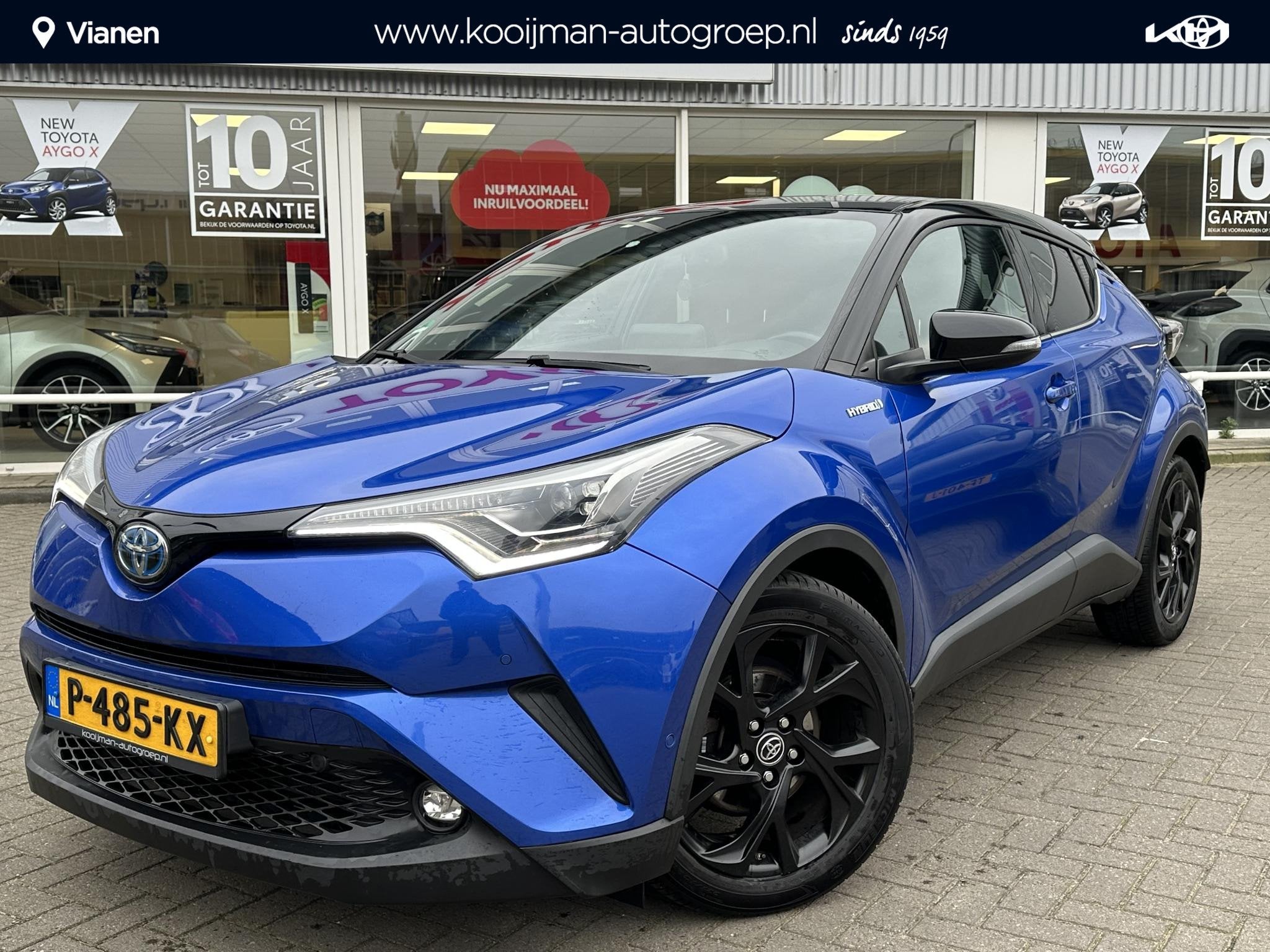 Toyota C-HR 1.8 Hybrid Executive Ultimate speciale uitvoerin, Auto's, Toyota, Euro 6, 4 cilinders, Blauw, Leder en Stof