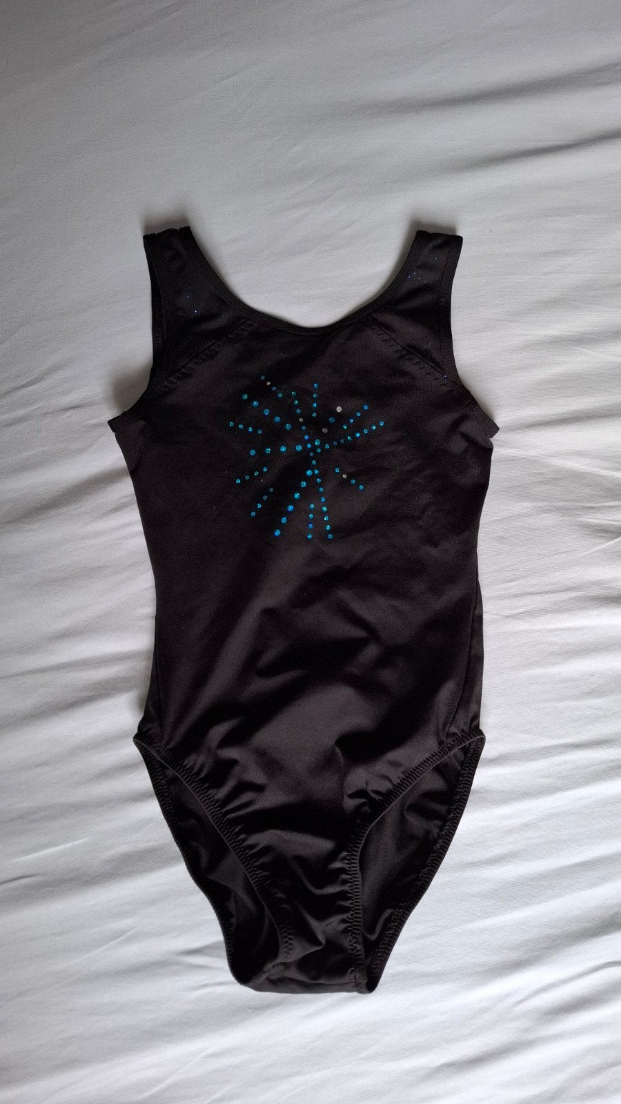 Turnpakje zwart met blauwe glitter maat 116-122, Sport en Fitness, Kleiner dan kindermaat 122, Ophalen of Verzenden, Zwart, Turnpak(je)