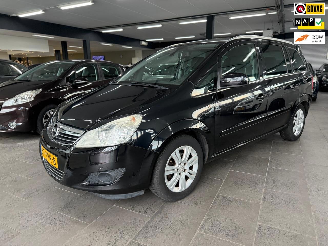 Opel Zafira 1.8 Cosmo automaat 7-prs half leer navigatie cli, Auto's, Gebruikt, Zwart, 4 cilinders, Zwart