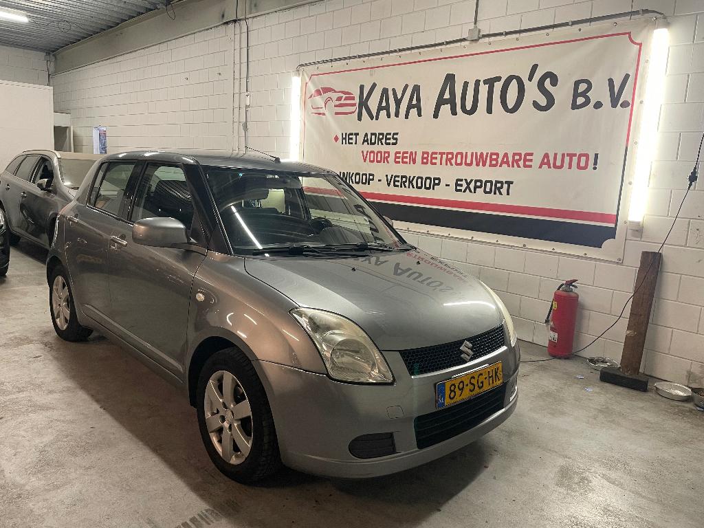 Suzuki Swift 1.3 5D 2006 Grijs, Auto's, Voorwielaandrijving, 40 €/maand, 965 kg, 400 kg