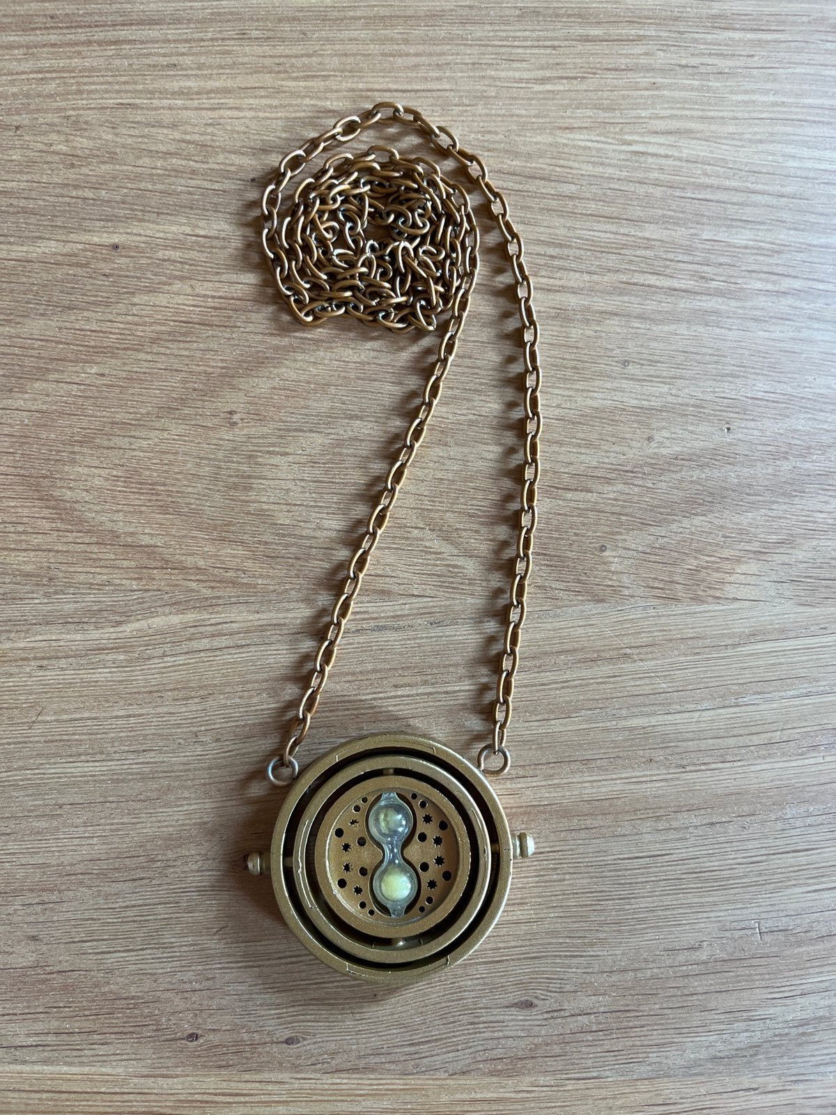 Harry Potter Tijdverdrijver Ketting - Goudkleurig, Gebruikt, Ophalen of Verzenden, Goud, Overige materialen