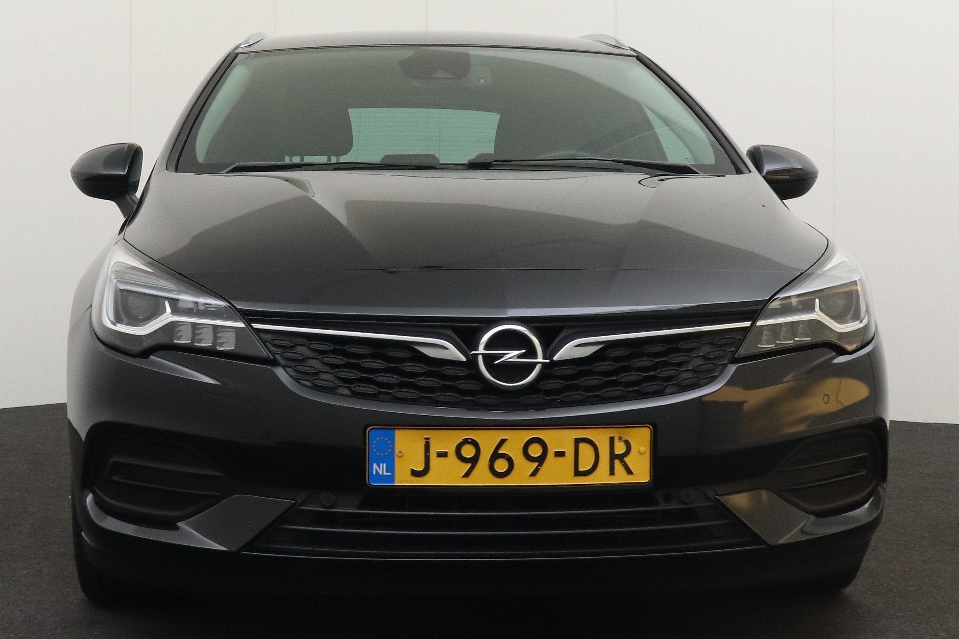 Opel Astra Sports Tourer 1.2 Elegance Trekhaak Carplay Digi., Auto's, Voorwielaandrijving, Dealer onderhouden, 1199 cc, Leder en Stof