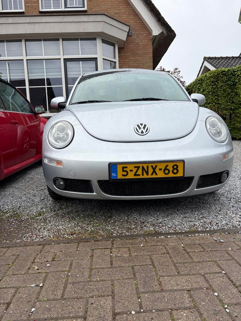 Volkswagen New Beetle 1.6 75KW 2010 Grijs in topstaat., Auto's, Volkswagen, 4 cilinders, 4 stoelen, Bedrijf, Handgeschakeld