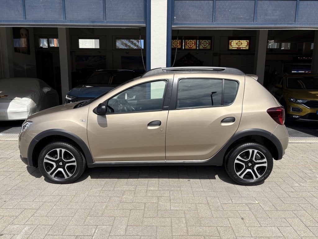Dacia Sandero 0.9 TCe SL Stepway AIRCO/NAVI/BLUETOOTH/CRUISE, Auto's, Dacia, Voorwielaandrijving, 898 cc, Euro 6, Bruin