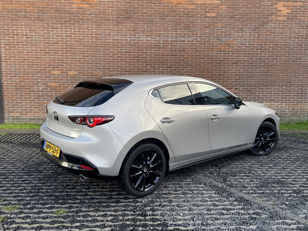Mazda 3 2.5 e-SkyActiv-G M Hybrid 140 Homura (bj 2025), Auto's, Mazda, Voorwielaandrijving, Stof, Gebruikt, 4 cilinders