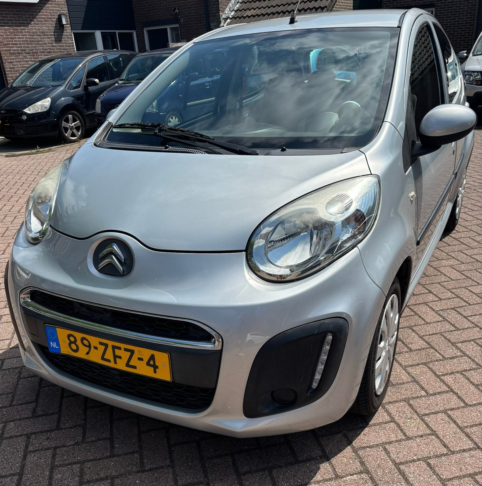 Citroën C1 1.0i 68PK 5D 2012 Grijs, Auto's, Citroën, Voorwielaandrijving, 4 stoelen, C1, Origineel Nederlands