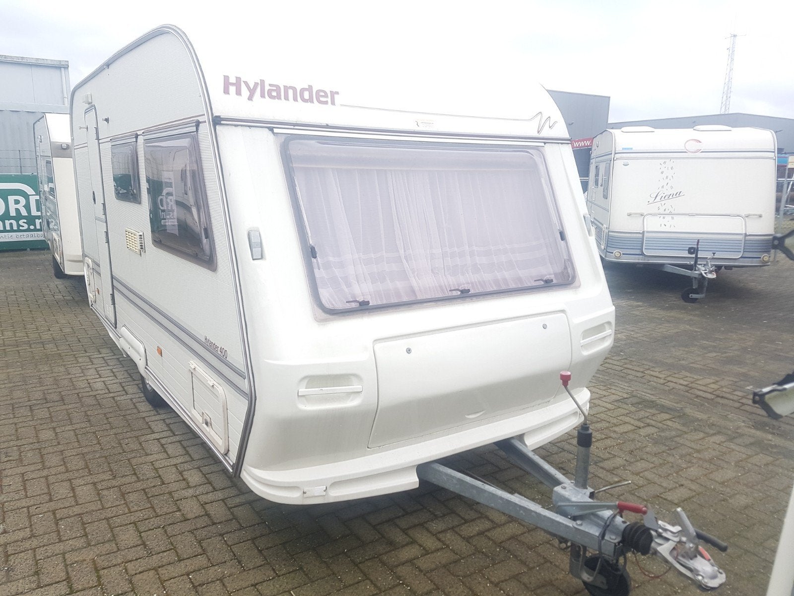 Te Koop zeer nette en goed onderhouden Hylander 400., Caravans en Kamperen, Caravans, Particulier, Luifel, Vast bed