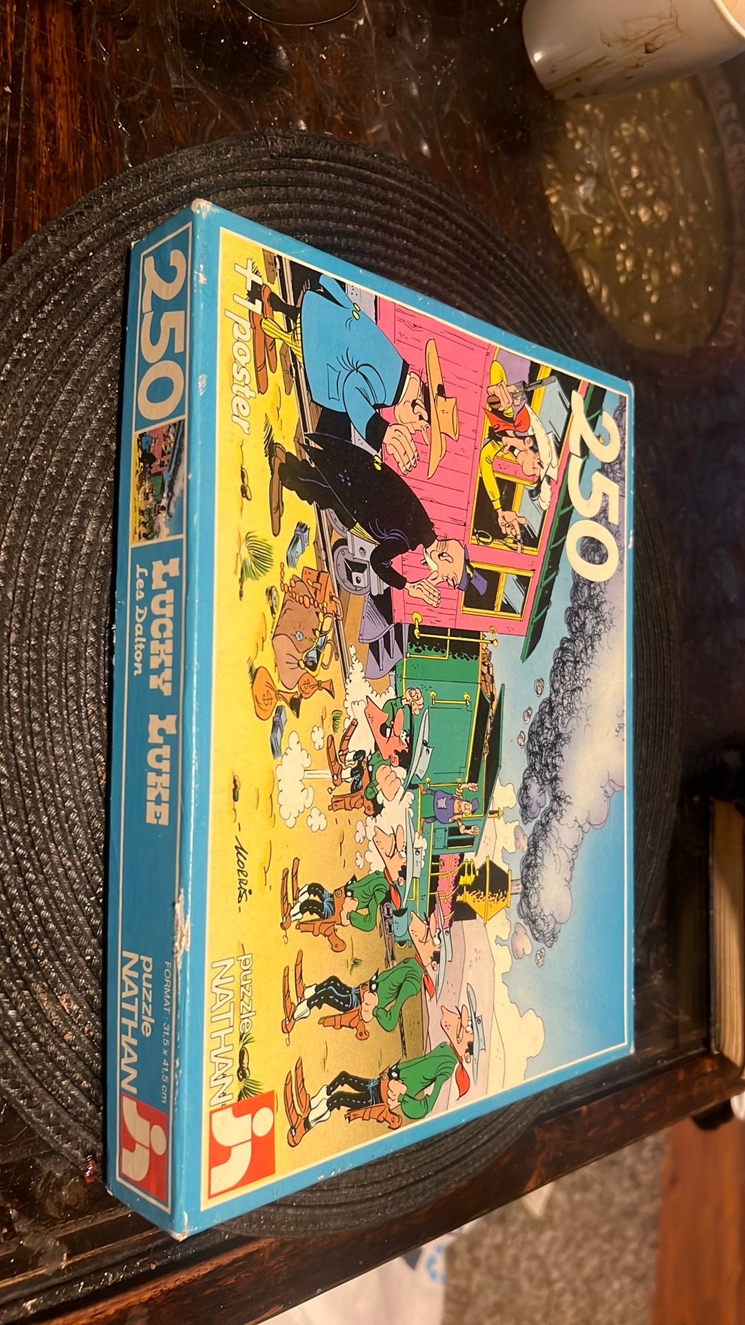 Lucky luke puzzel plus poster / 250 stiks, Eén stripboek, Ophalen of Verzenden, Gelezen