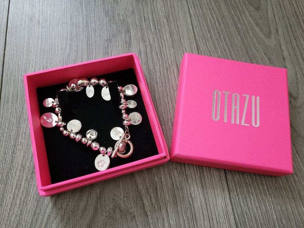 OTAZU zilveren Pink Ribbon armband ~ NH0604, Ophalen of Verzenden, Zo goed als nieuw, Met bedels of kralen, Zilver
