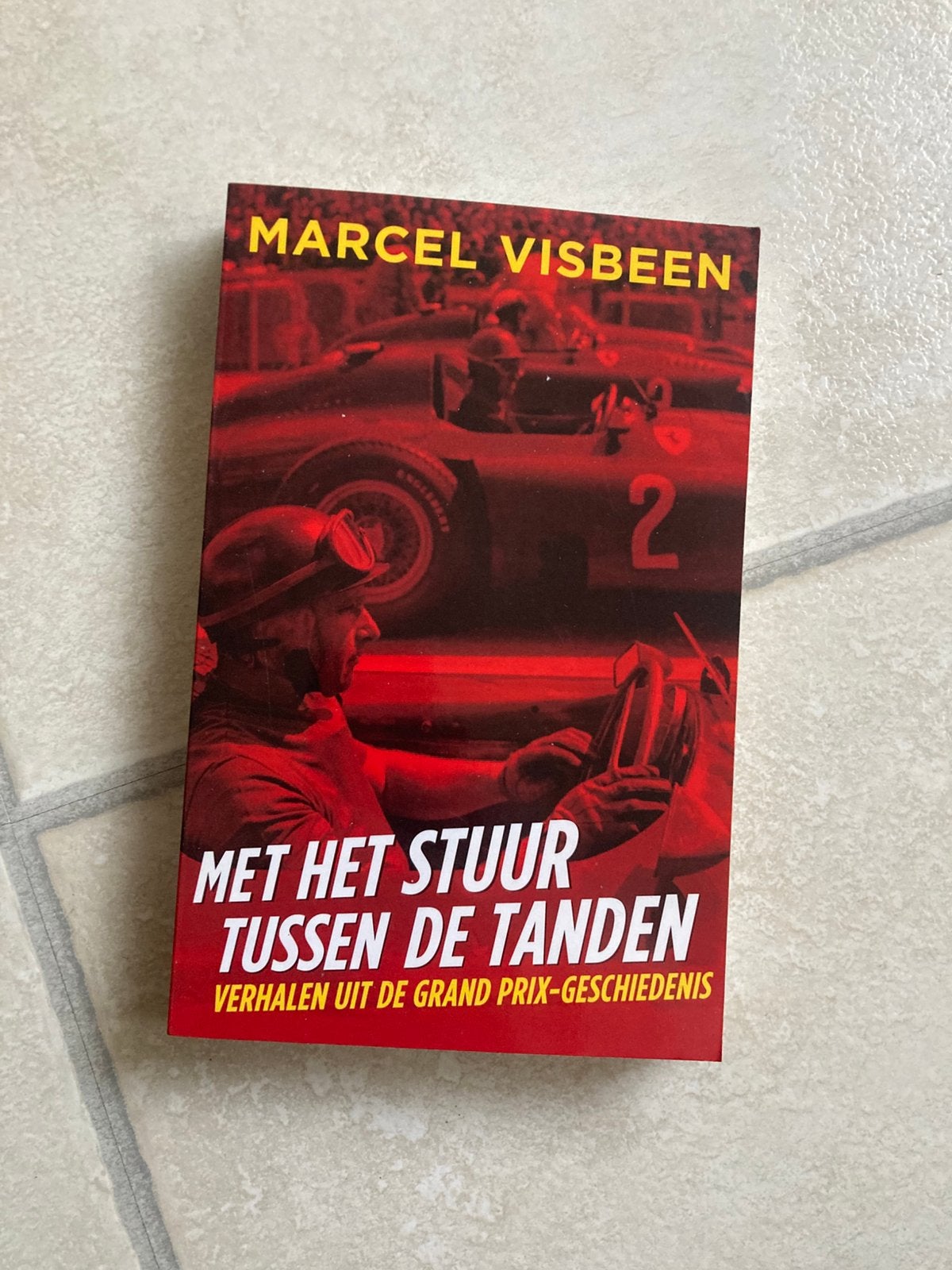 Met het stuur tussen de tanden, Ophalen of Verzenden, Zo goed als nieuw, Formule 1