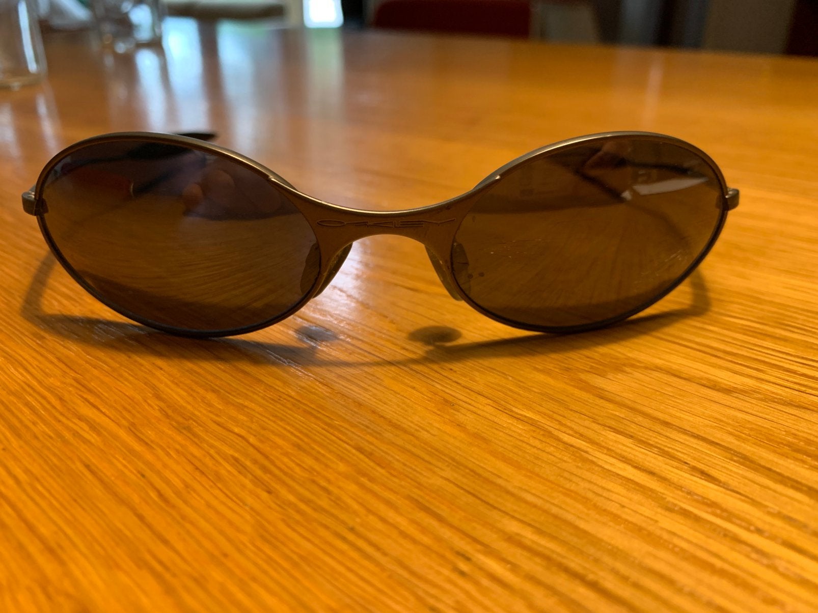 Vintage Oakley E wire, Ophalen of Verzenden, Gebruikt, Zonnebril, Oakley