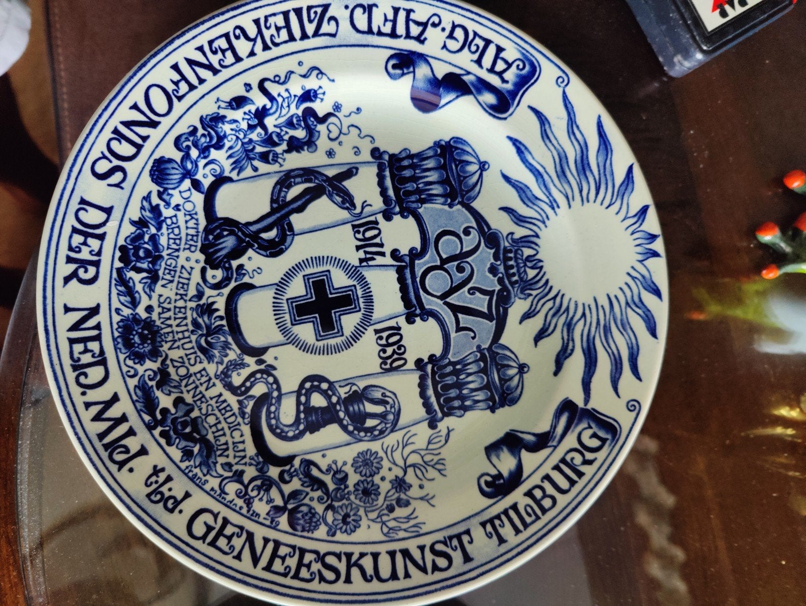 Blauw wandbord 'Alg. Afd. Ziekenfonds Tilburg' 1914-1, Ophalen
