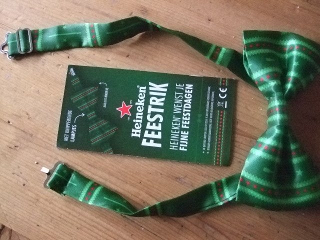 Heineken feestrik (nr.1) met lampje, Verzamelen, Biermerken, Ophalen of Verzenden, Nieuw, Overige typen, Heineken