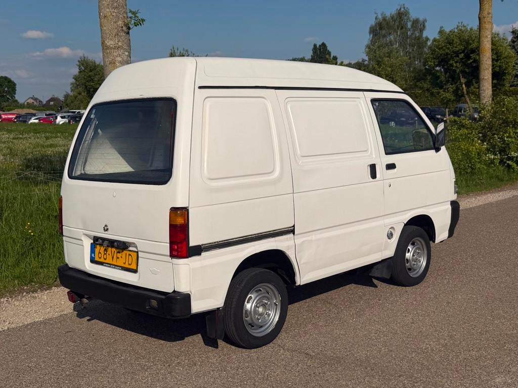 Daihatsu HiJet 1.3 EFI Standaard NAP, Auto's, Bestelauto's, Stof, 4 cilinders, 400 kg, Wit