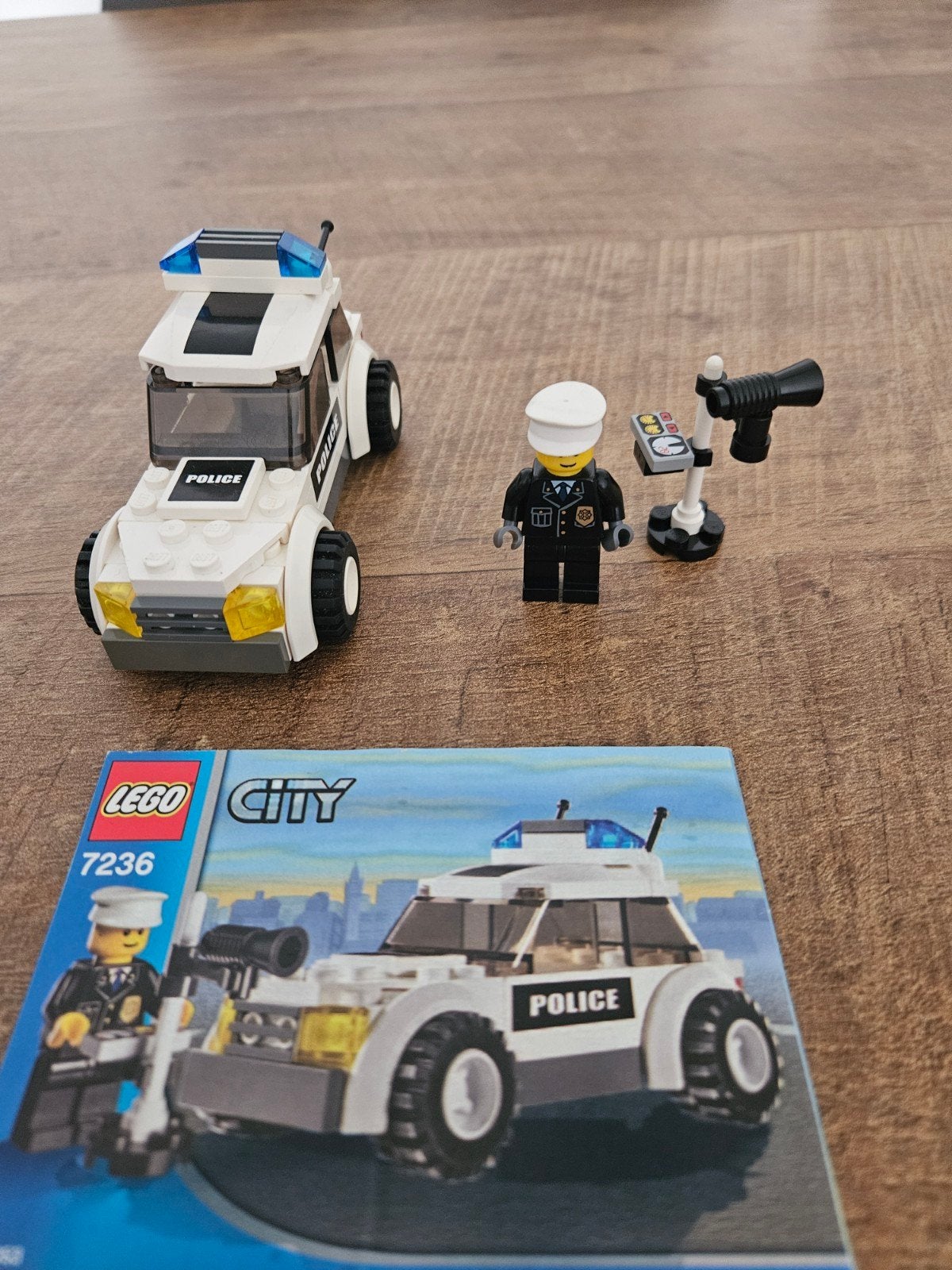 Lego City Politieauto 7236 met minifiguur en instructies, Compleet, Lego, Ophalen of Verzenden, Complete set