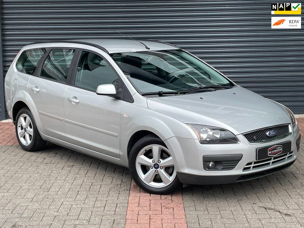 Ford Focus Wagon 1.8-16V Ambiente Flexifuel Airco | Pdc | Cr, Gebruikt, Zwart, 4 cilinders, Handgeschakeld