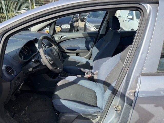 Opel Corsa 1.4-16V Enjoy APK T/M 17-11-2027, Voorwielaandrijving, Dealer onderhouden, Gebruikt, Zwart