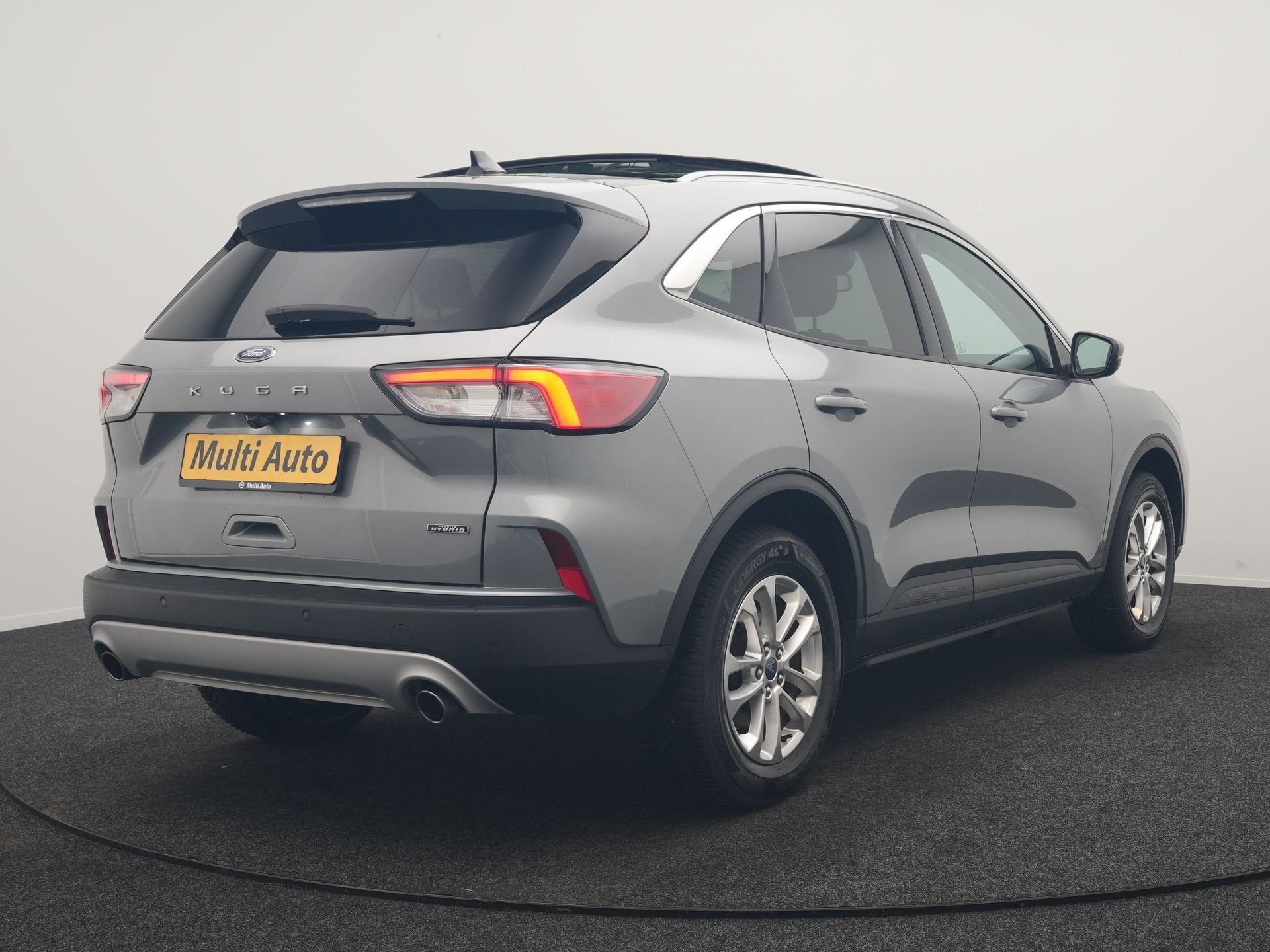 Ford Kuga 2.5 PHEV Titanium 225pk Dealer O.H. | Trekhaak Afn, Auto's, Dealer onderhouden, Gebruikt, Zwart, 4 cilinders
