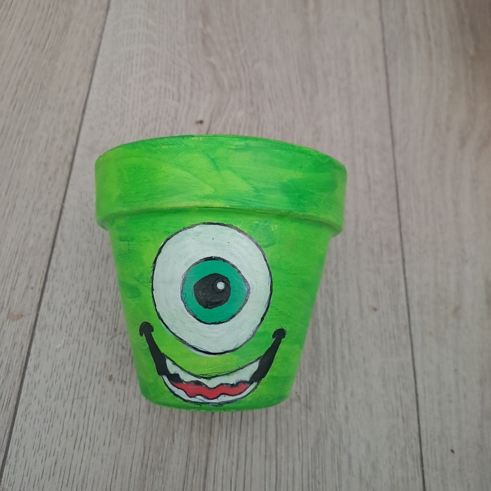 Leuke groene bloempot met oogje - 11 cm diameter, Gebruikt, Rond, Binnen, Ophalen of Verzenden