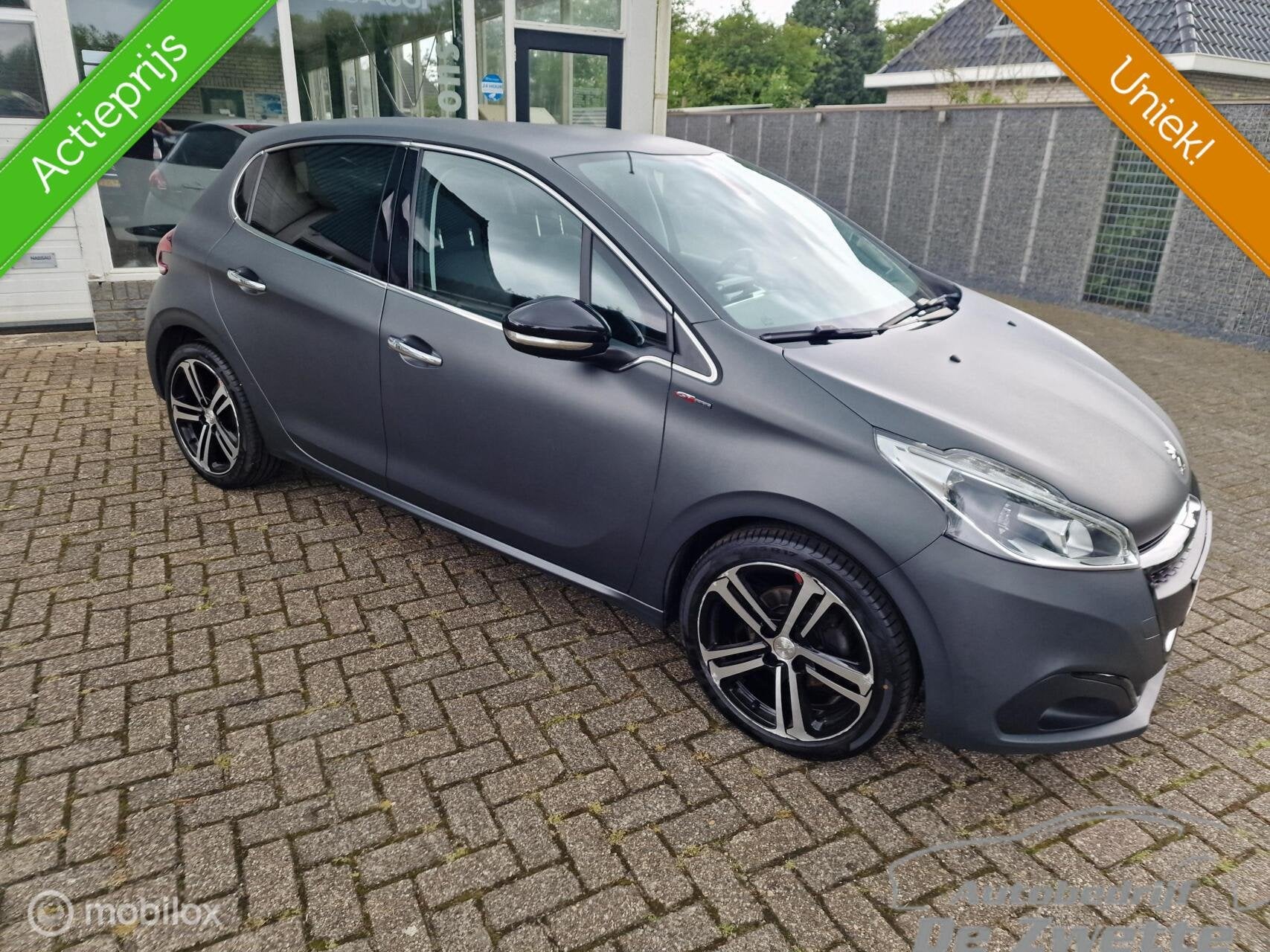 Sportieve blikvanger! Peugeot 208 lees de advertentie goed!, Voorwielaandrijving, Euro 6, Leder en Stof, 23 km/l