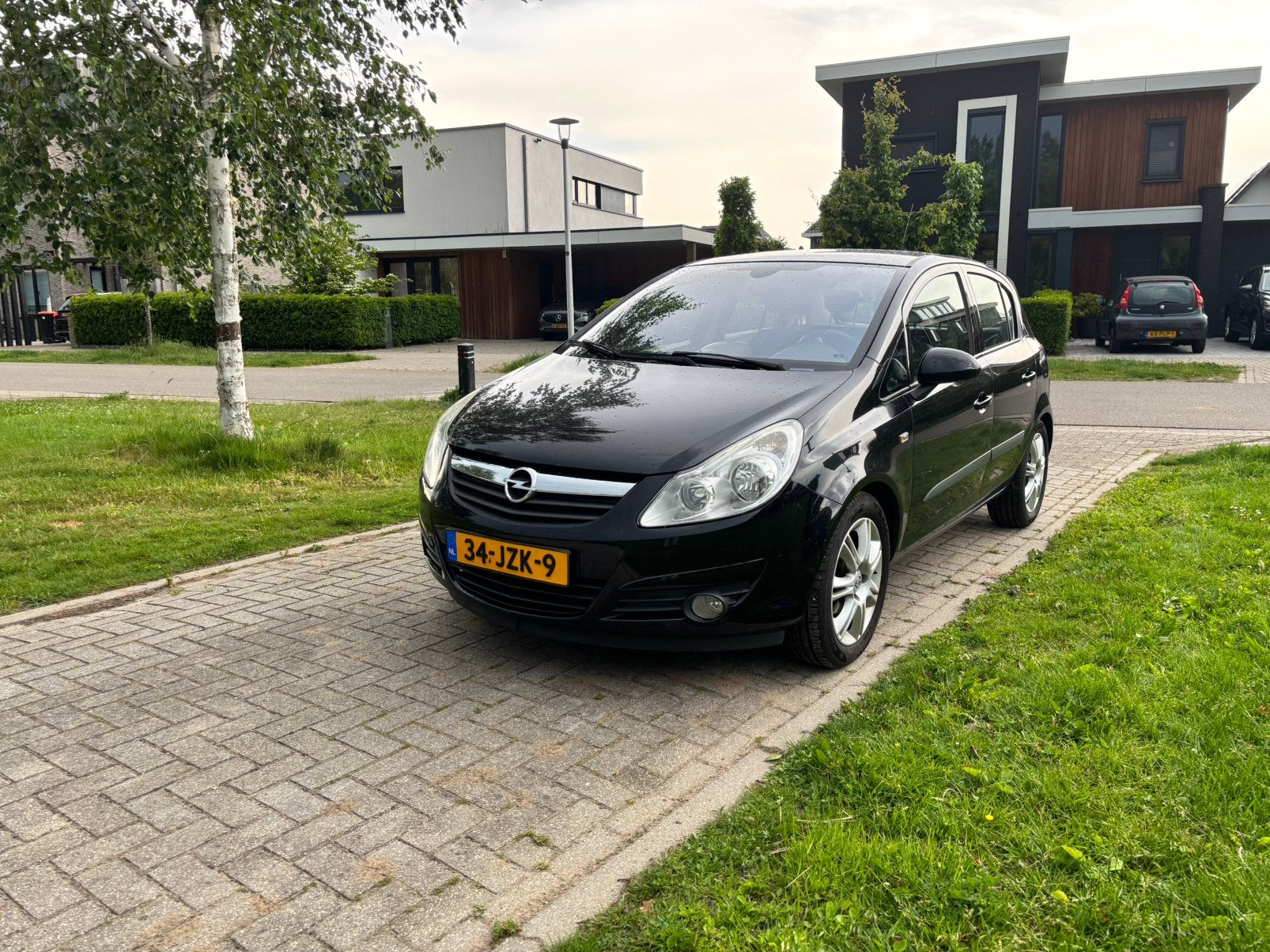 Opel Corsa 1.4 16V 5D 2009 Zwart, Auto's, Opel, Voorwielaandrijving, 1063 kg, 4 cilinders, Origineel Nederlands