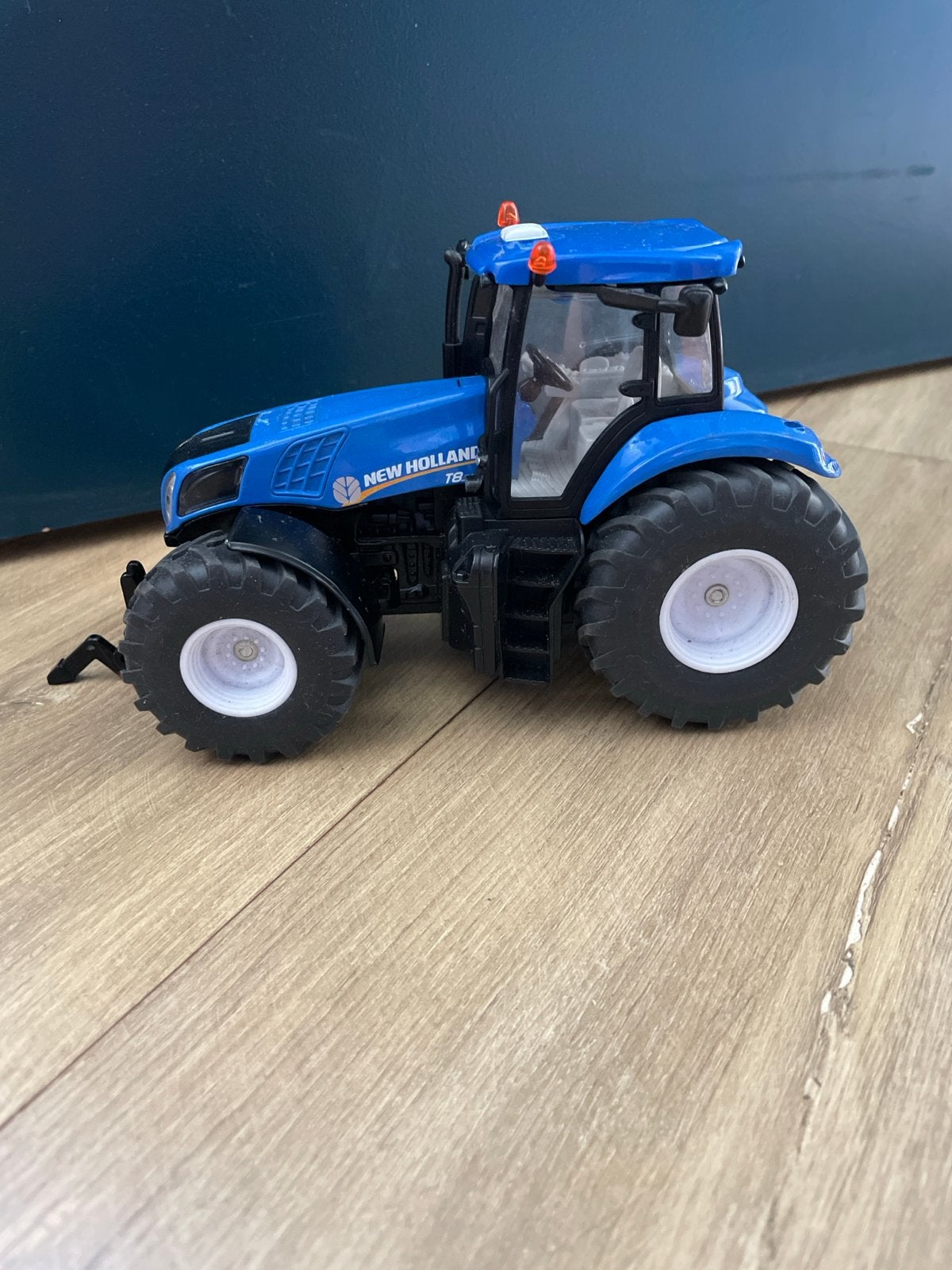 New Holland T8 speelgoedtractor, Ophalen of Verzenden, Zo goed als nieuw