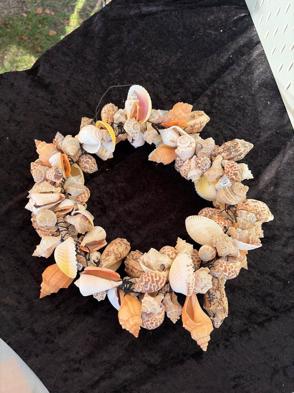 Decoratieve schelpenkrans - Handgemaakt, Ophalen of Verzenden, Zo goed als nieuw, Krans, Schelpen
