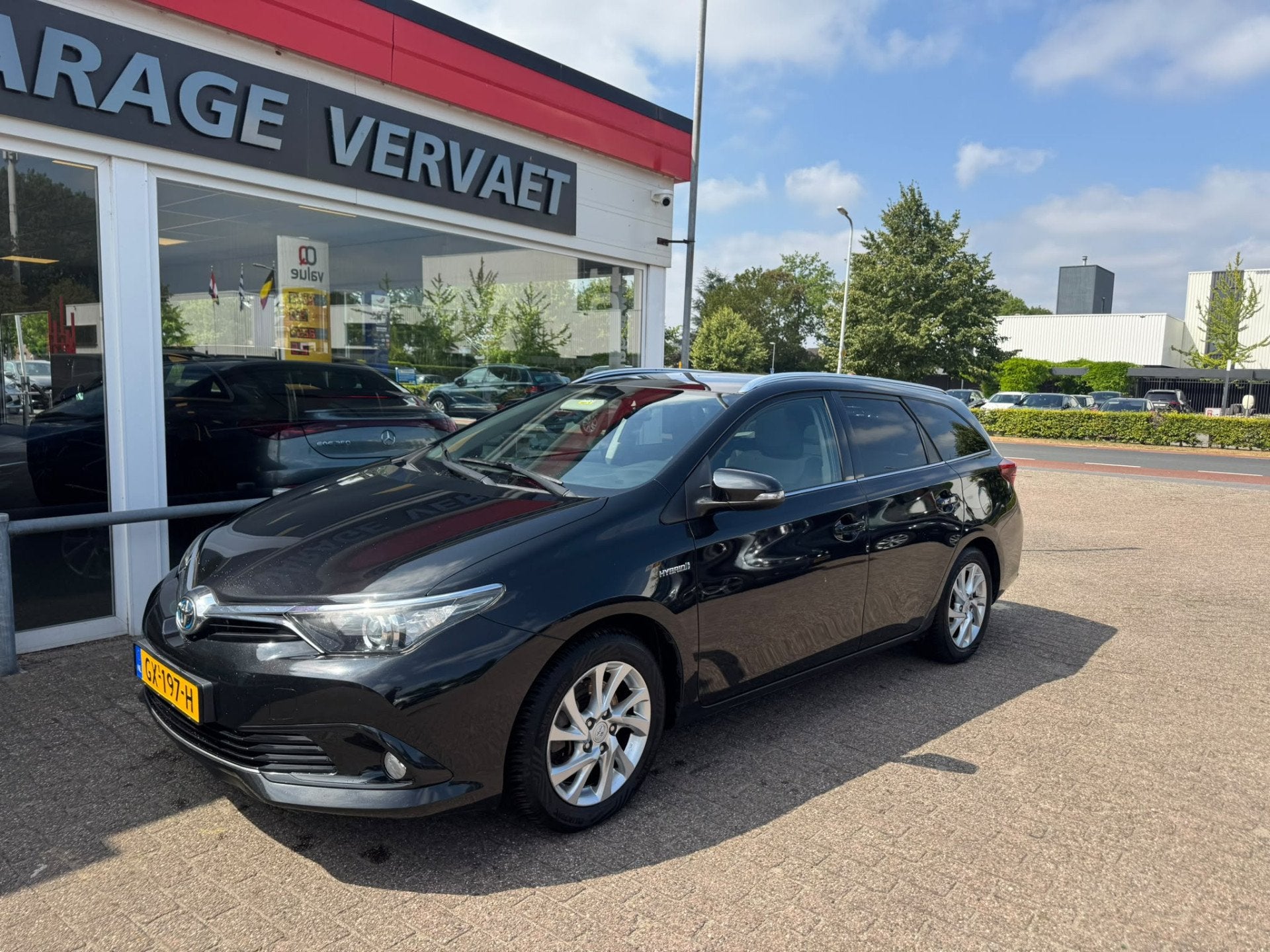 Toyota Auris Touring Sports 1.8 Hybrid Lease (bj 2015), Auto's, Toyota, Stof, Gebruikt, Origineel Nederlands, Hybride Elektrisch/Benzine