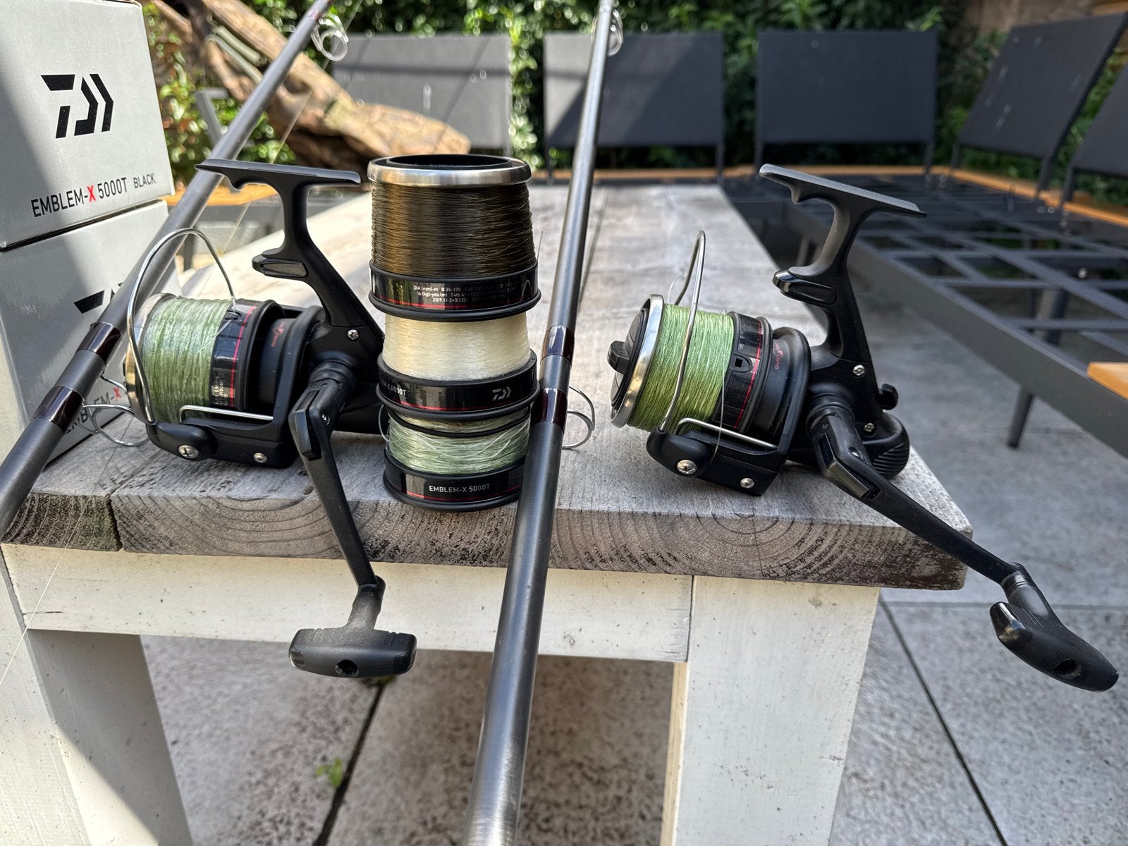 2x Daiwa Emblem-X 5000T Black molens, Ophalen, Gebruikt, Molen