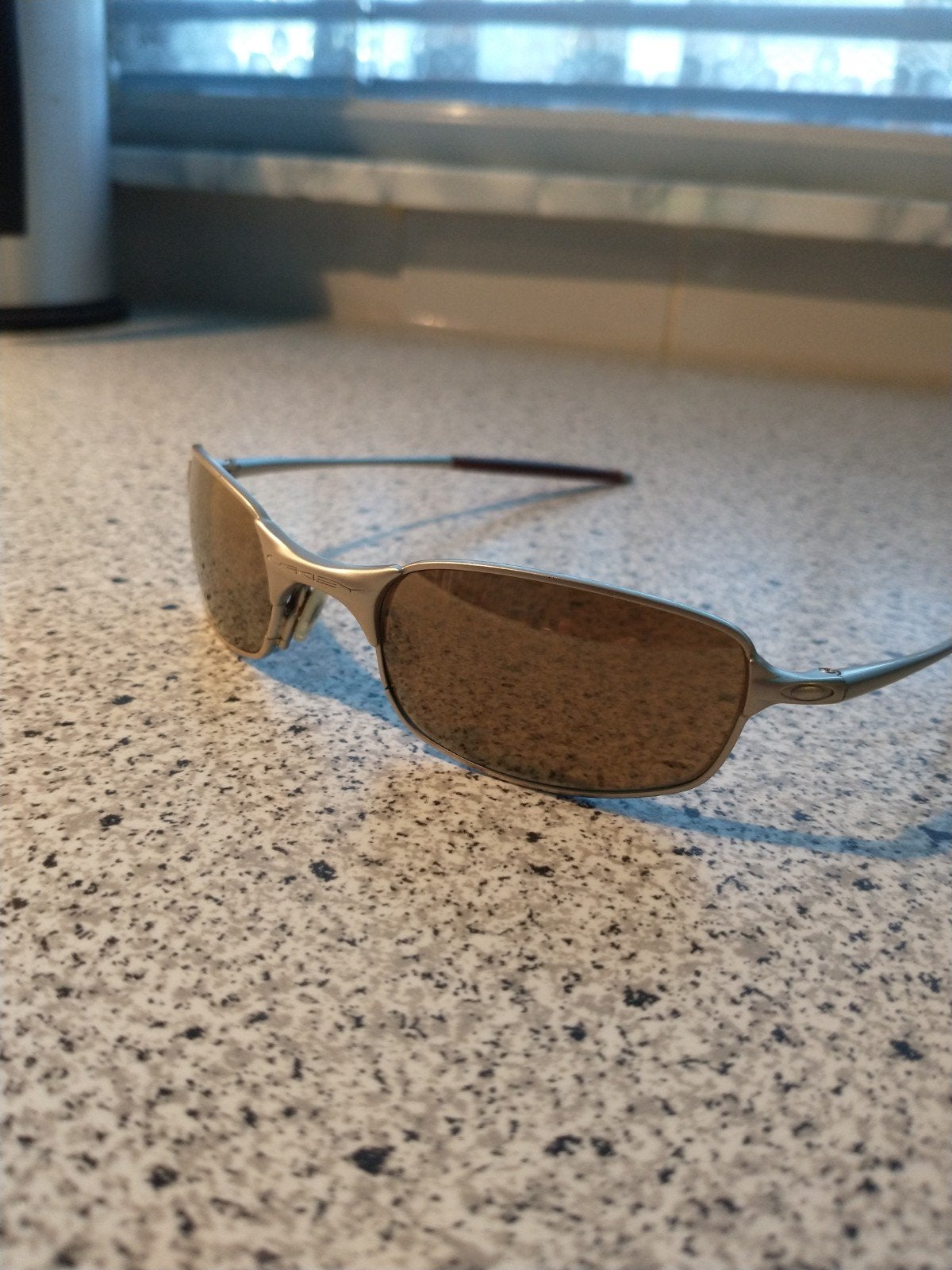 OAKLEY E-WIRE GOLD IRRIDIUM (duurste uitvoering), Ophalen of Verzenden, Zo goed als nieuw, Oakley