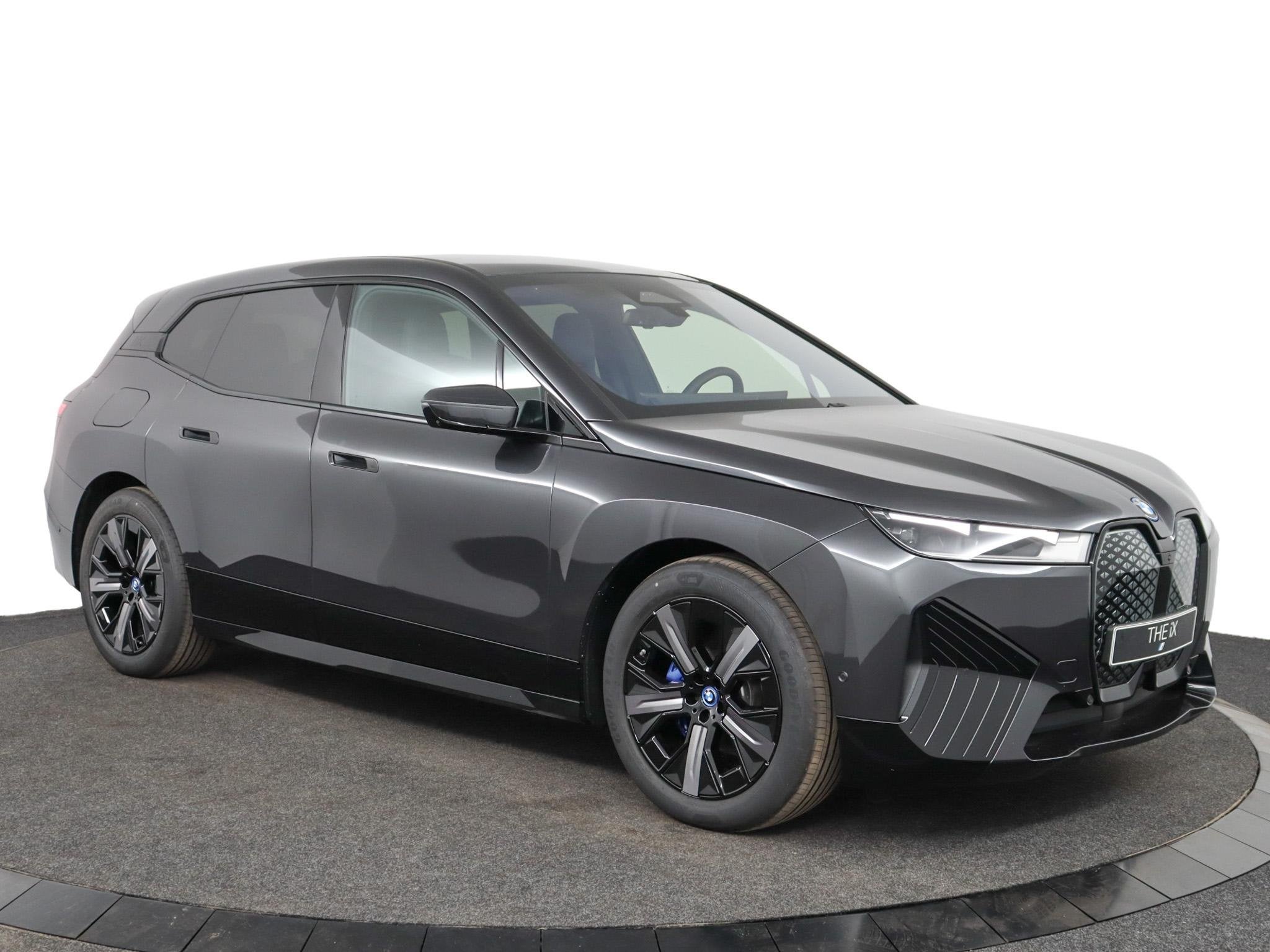 BMW iX xDrive40 | SOH 100% | Sport Package | Panoramadak | H, Auto's, Stof, Gebruikt, Met garantie (alle), Origineel Nederlands