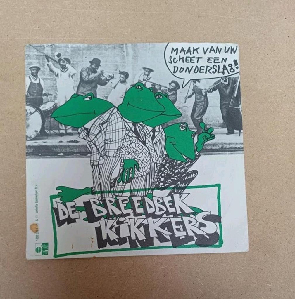 De Breedbekkikkers  - Maak Van Uw Scheet Een Donderslag, Beschermende buitenhoes, Ophalen of Verzenden, Gebruikt, Nederlandstalig
