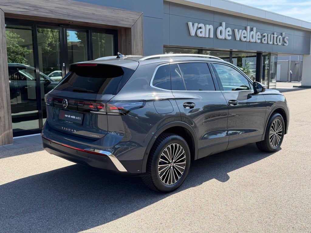 Volkswagen Tiguan 1.5 eHybrid Elegance 204pk | Trekhaak | Al, Auto's, Volkswagen, 12 maanden, Zwart, SUV of Terreinwagen, Automatische klimaatregeling