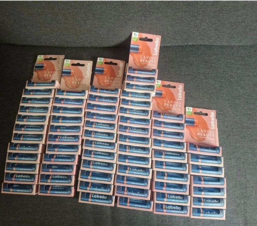 65x Labello Caring Beauty Lipbalm - Nude (advr 169), Nieuw, Ophalen of Verzenden, Make-up, Overige kleuren