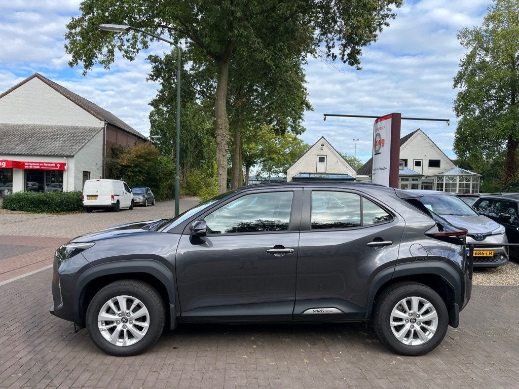 Toyota YARIS CROSS 1.5 HYBRRID DYNAMIC AUTOMAAT / CAMERA / C, Auto's, Gebruikt, 1490 cc, Bedrijf, Hybride Elektrisch/Benzine
