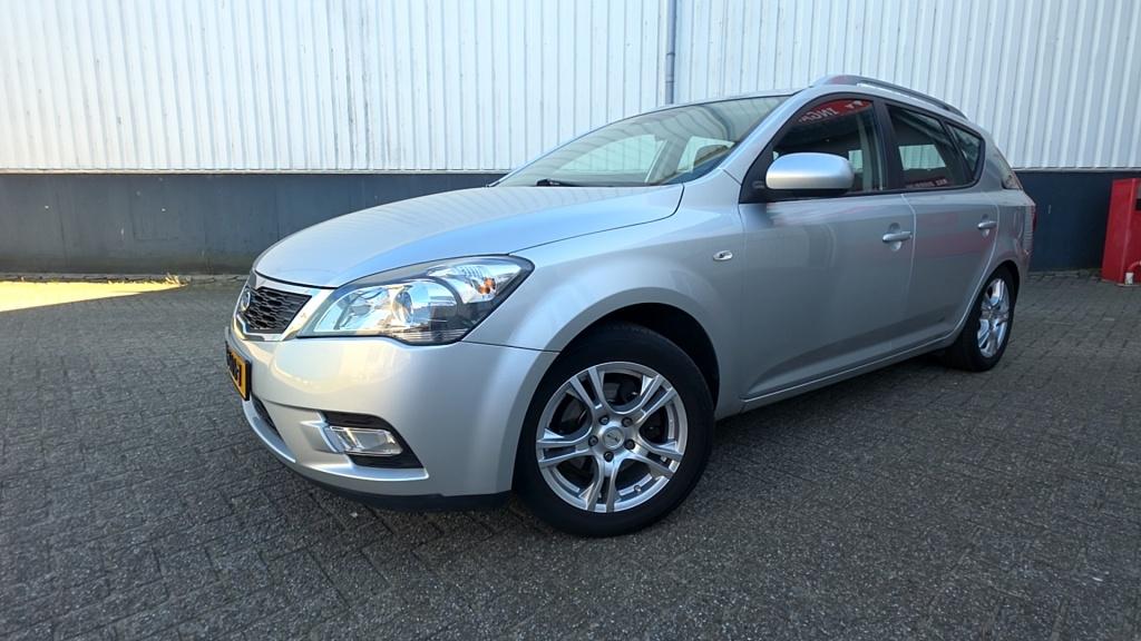 Kia cee'd Sporty Wagon 1.4 CVVT X-ecutive (bj 2009), Auto's, Gebruikt, 4 cilinders, 1396 cc, Multifunctioneel stuurwiel