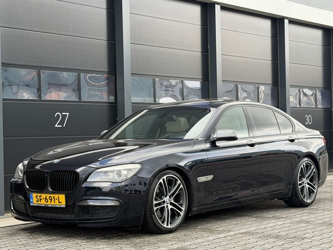 BMW 7 Serie 730d M-Pakket Head-Up Dak Leer (bj 2010), Auto's, Automaat, 2993 cc, Zwart, Bedrijf