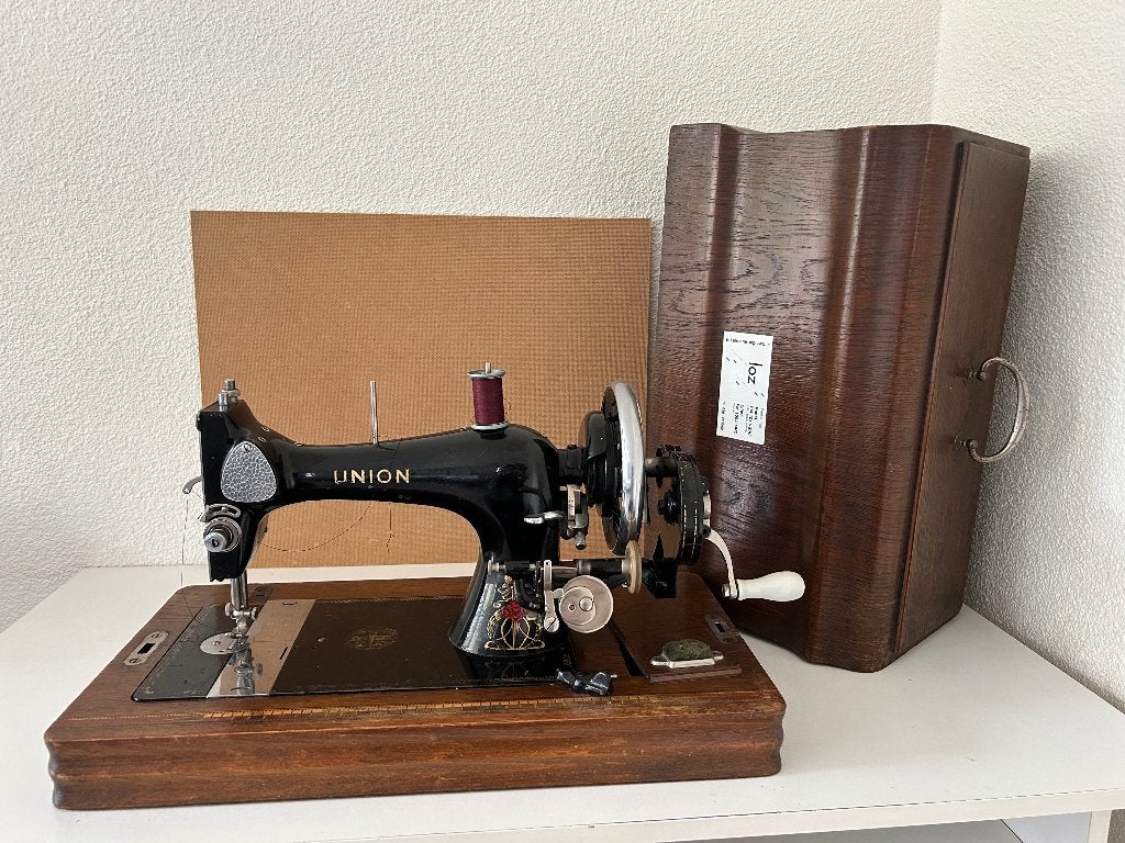 Union Antieke handnaaimachine, Ophalen