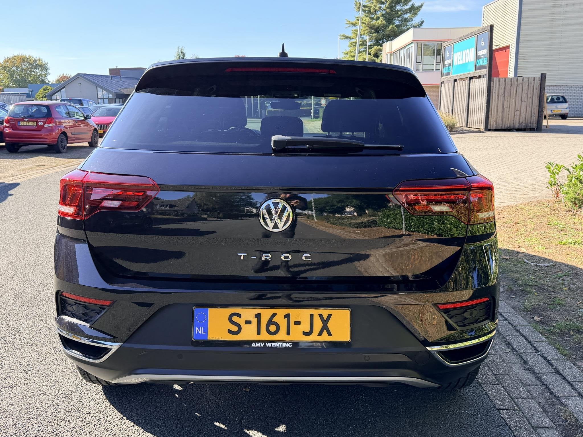 Volkswagen T-Roc 1.5 TSI Sport 150PK DSG•Navi•ACC, 4 cilinders, 150 pk, Zwart, Bedrijf
