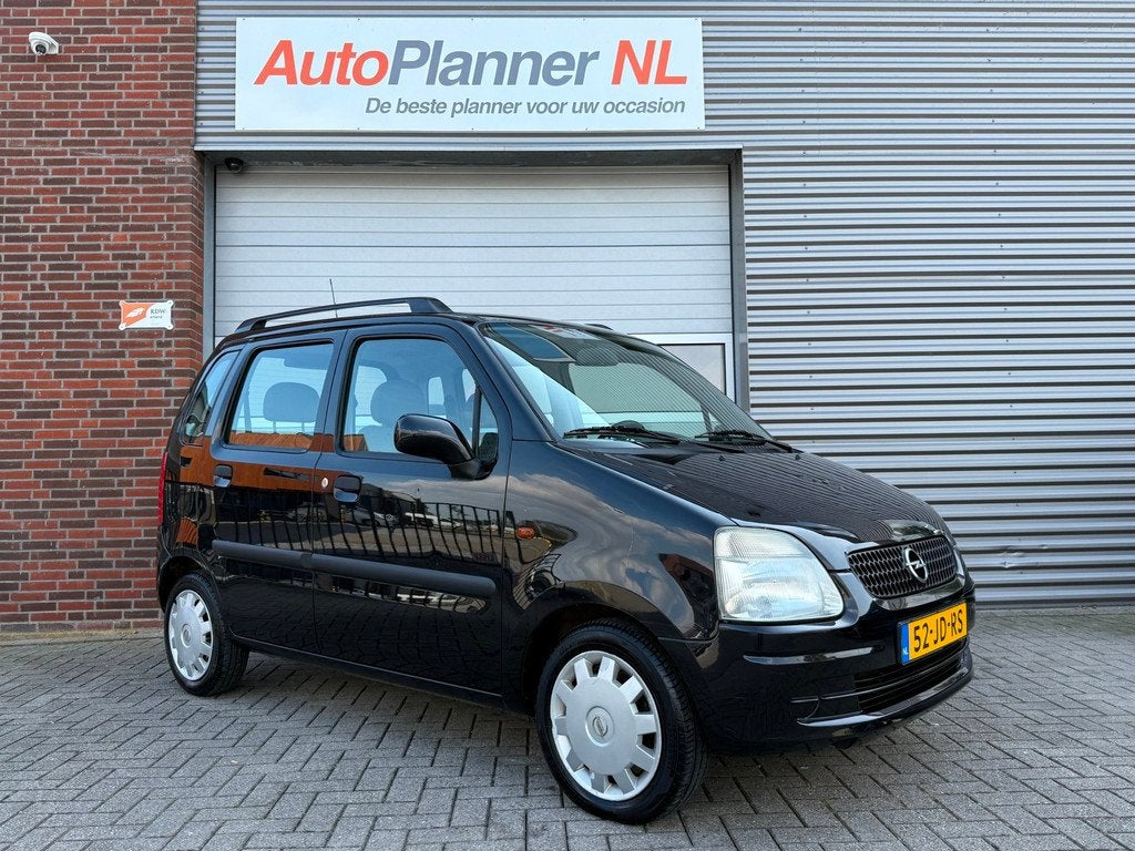 Opel Agila 1.2-16V Comfort! APK 03-2027! Lage kmstand!, Auto's, Voorwielaandrijving, Gebruikt, 31 €/maand, Zwart