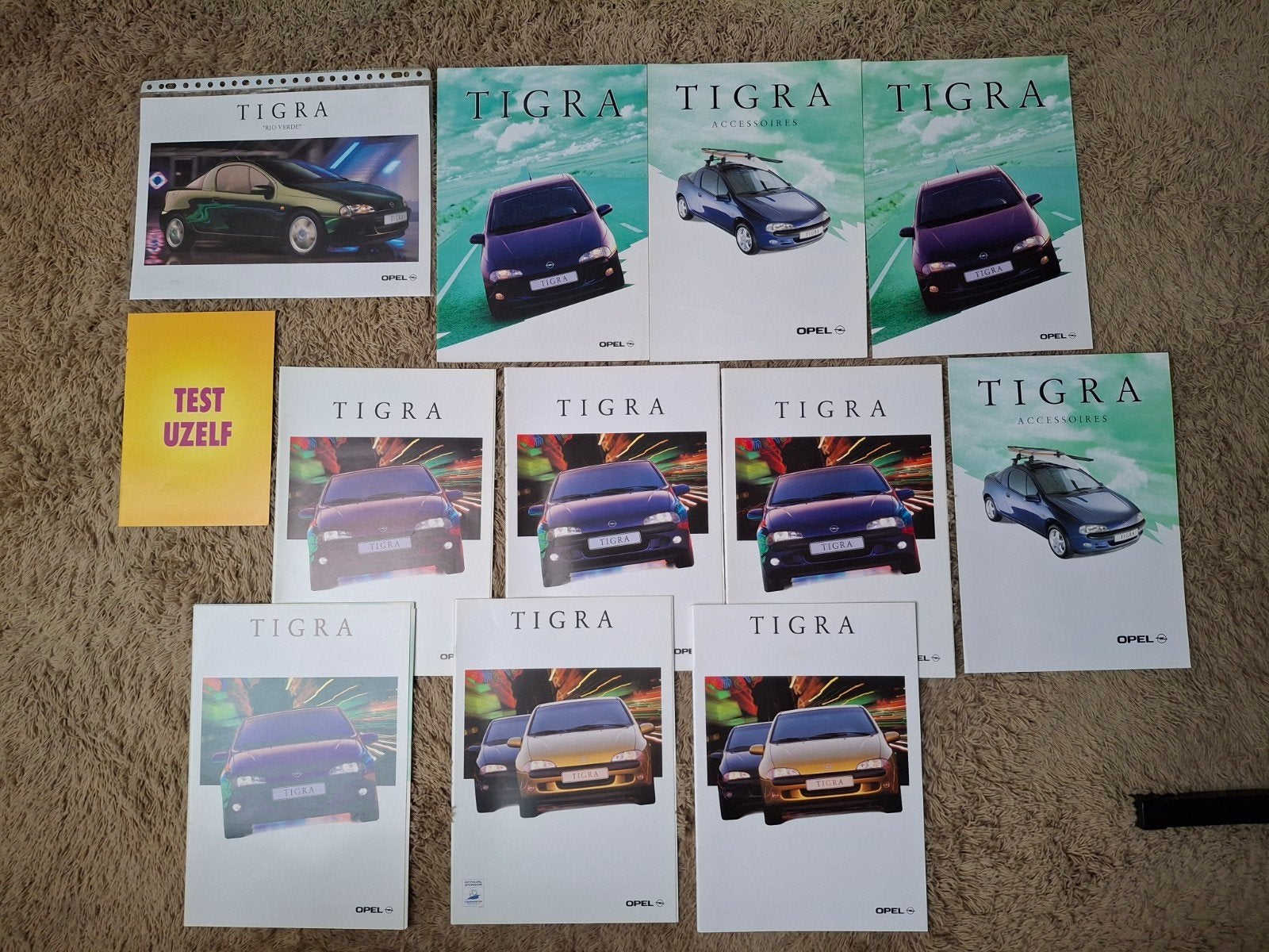 Lot autofolders Opel Tigra, Boeken, Verzenden, Opel