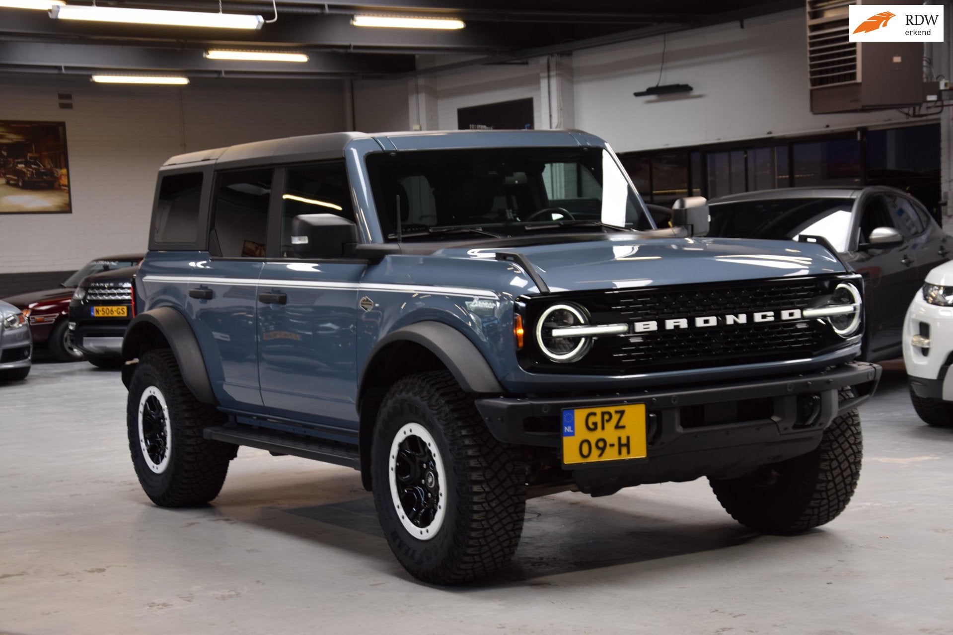 Ford Bronco 2.7 V6 5-persoons Wildtrak Sasquatch Package Aut, Auto's, Automaat, Dealer onderhouden, Blauw, Bedrijf