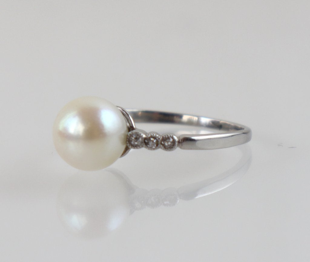 Art Deco platina ring met parel en diamantjes, Ophalen of Verzenden, Overige materialen, Ring, Met edelsteen
