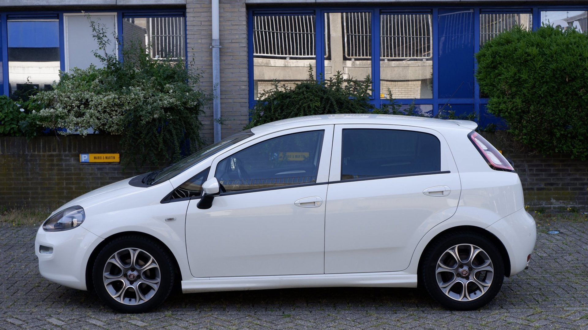 Fiat Punto Evo 1.3 M-Jet Lounge, Auto's, Fiat, Voorwielaandrijving, Euro 5, Stof, Gebruikt
