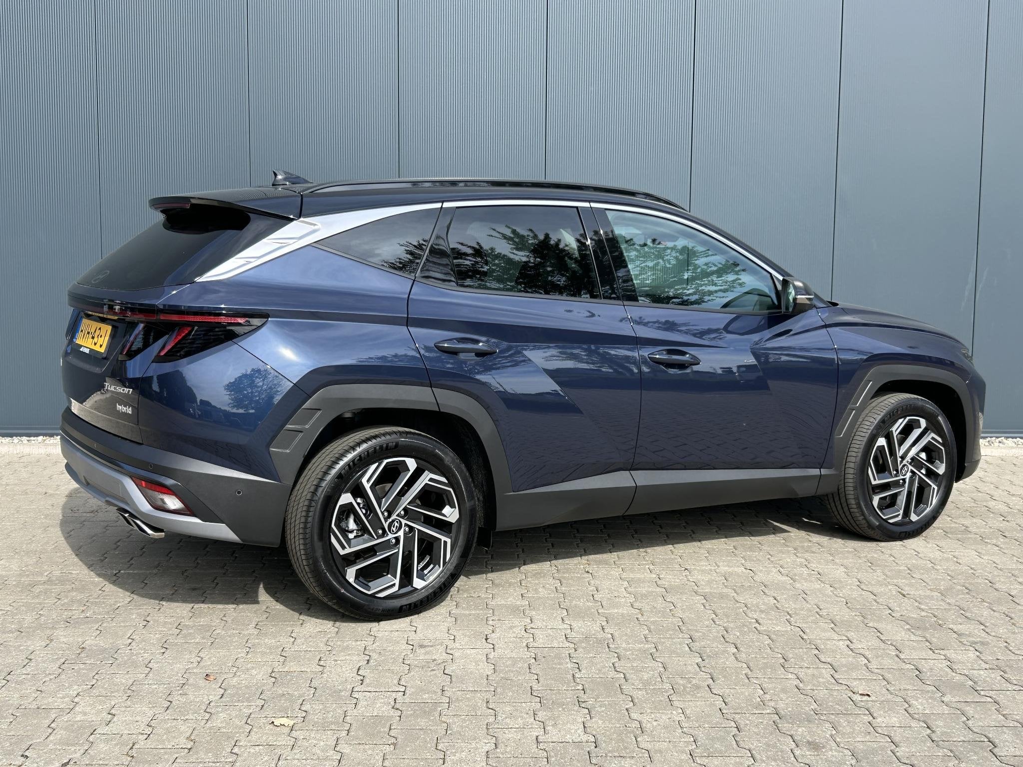 Hyundai Tucson 1.6 T-GDI HEV Premium / Leder / 360 Camera /, Auto's, Euro 6, 4 cilinders, 1360 kg, Blauw
