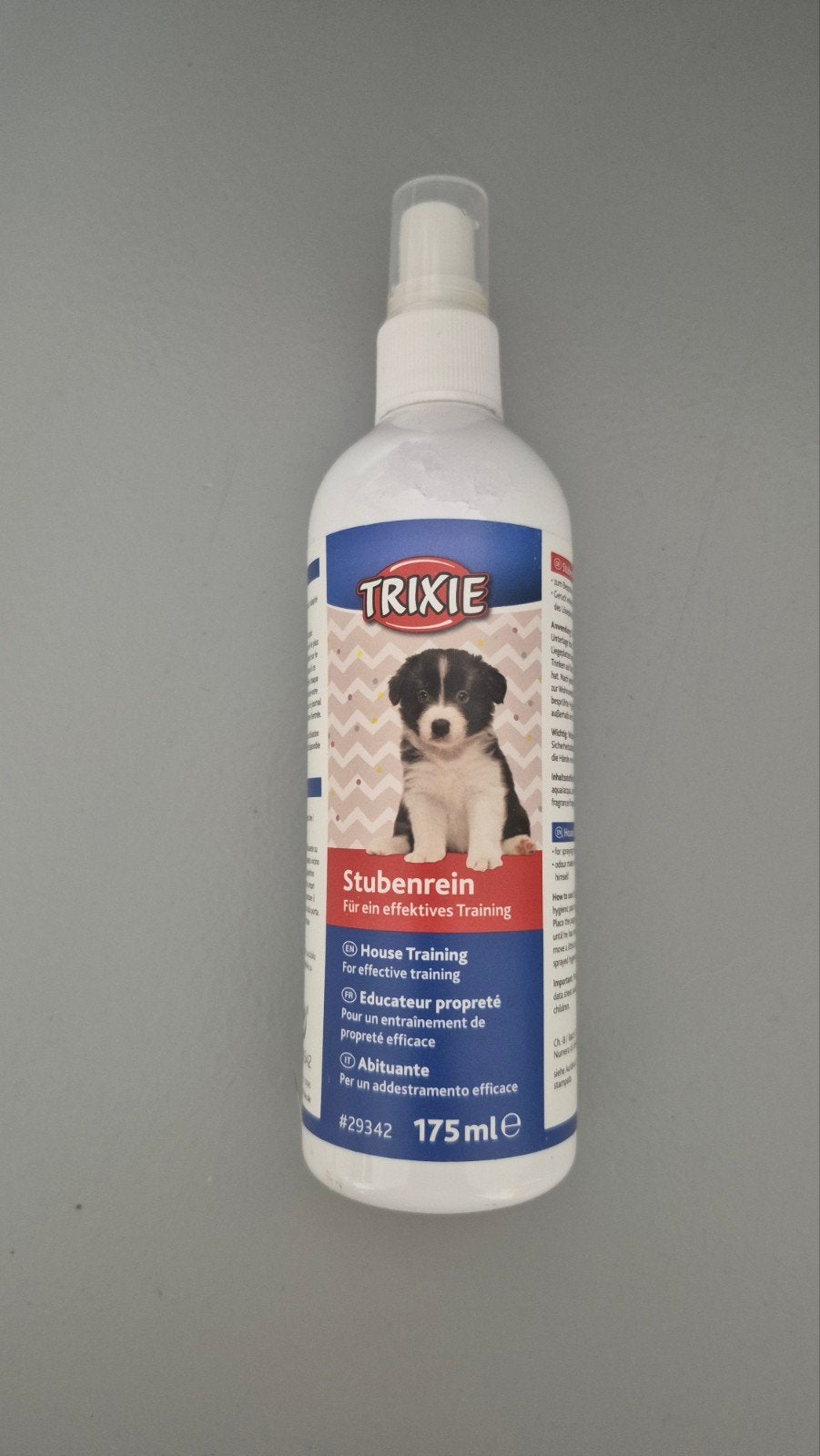 Bijna volle fles trixie plastraining voor puppy, Ophalen
