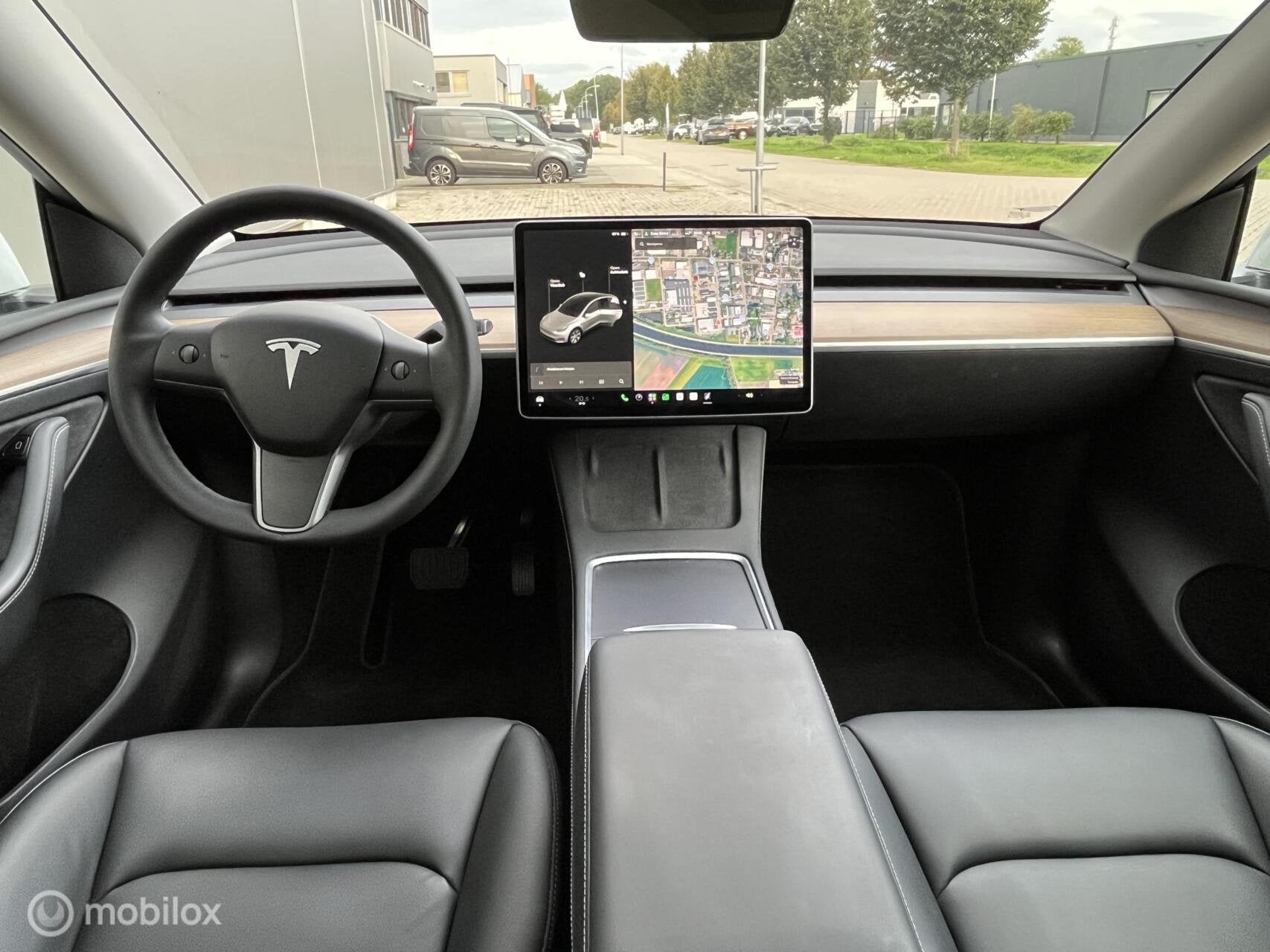 Foto 12 van Tesla Model Y Long Range AWD 75 kWh, FSD , Trekhaak Netjes