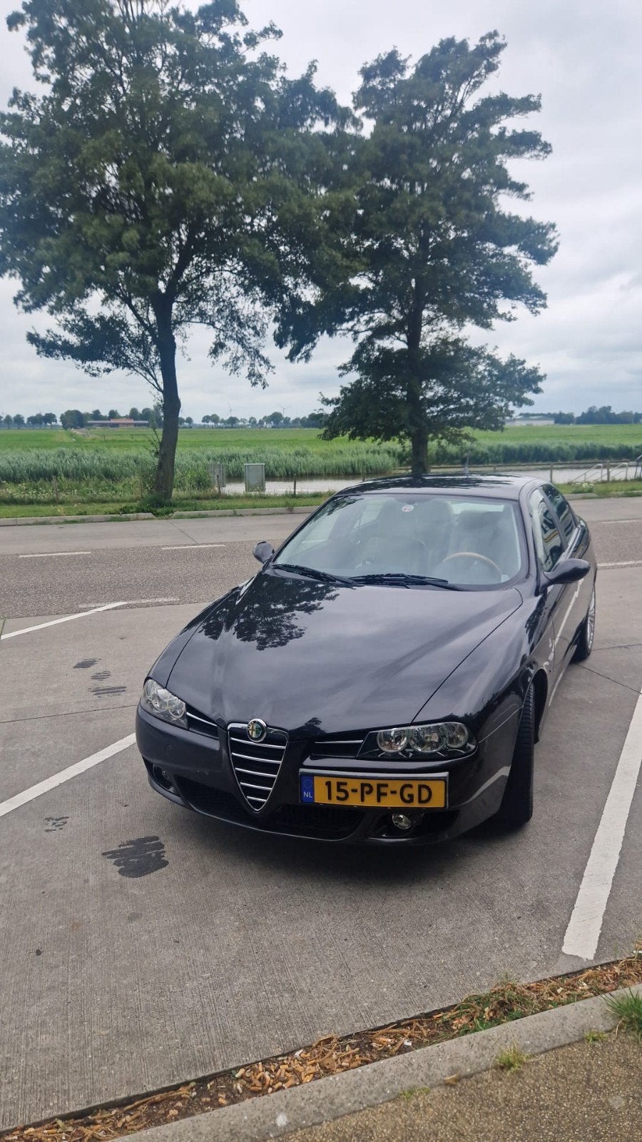 Alfa Romeo 156 2.0 JTS 2004 Zwart 161.000 km, Auto's, Voorwielaandrijving, Zwart, Origineel Nederlands, Handgeschakeld