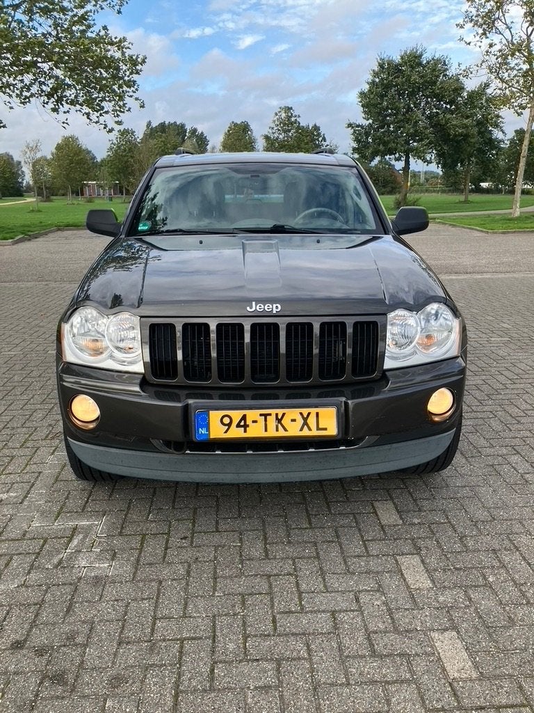 Jeep Grand Cherokee 5.7 HEMI V8 326PK Automaat LPG, Auto's, Automaat, 5654 cc, Bruin, 138 €/maand