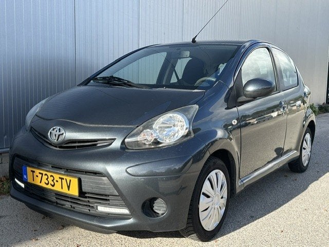 Toyota Aygo 1.0 VVT-i Comf. Or., Auto's, Euro 5, Stof, Gebruikt, 4 stoelen